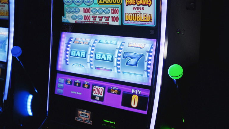 AG Gaming online slots reels glowing in neon colours