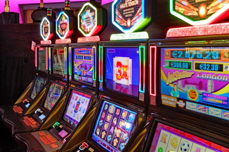 Live casino table with slot machines for AG Gaming live casino games